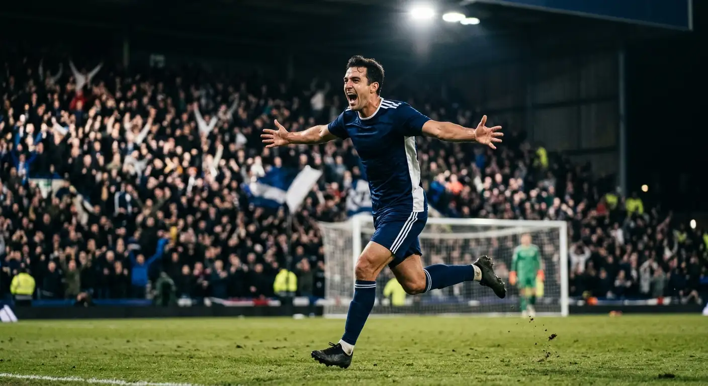 A footballer wheeling away in celebration after a late knockout-stage goal under stadium floodlights